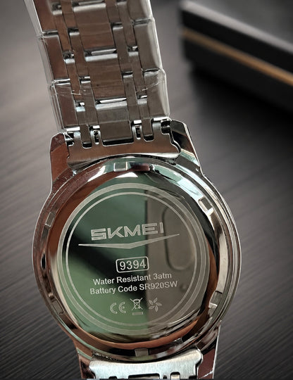 SKMEI 9394 Men’s Watch–Navy Blue Dial, Two-Tone Gold and Silver Design
