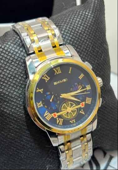 SKMEI 9394 Men’s Watch–Navy Blue Dial, Two-Tone Gold and Silver Design