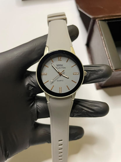 MRK Collection Luxury Women’s Watch – Elegant White Dial with Gold-Tone Case & Silicone Strap